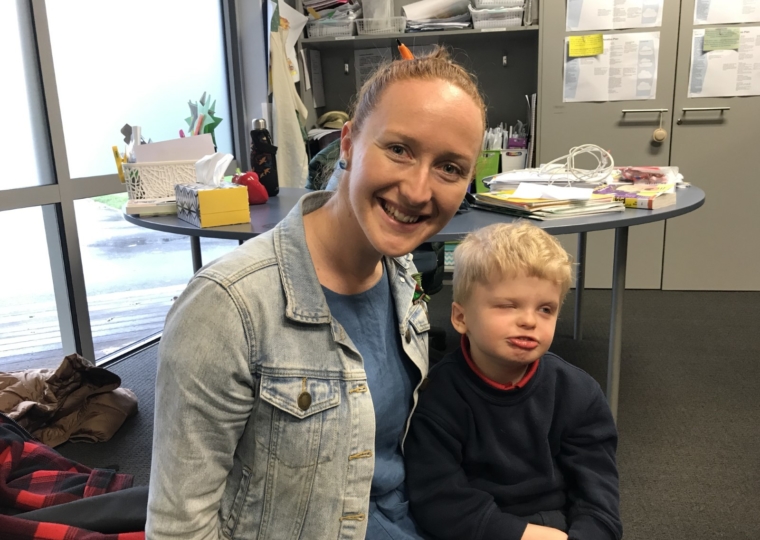 Teacher and student in classroom